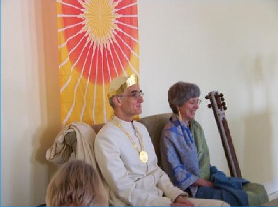09 listening.jpg - Raja Graham and his wife Leanne enjoy listening via teleconference to Raja Hagelin, Raja of Invincible America, who expresses his deep fulfilment at their bringing to fruition the Maharishi Peace Palace for Minnesota.
